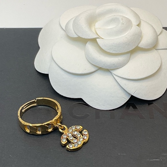 CHANEL Jewelry - CHANEL Gold Ring with Crystal Charm